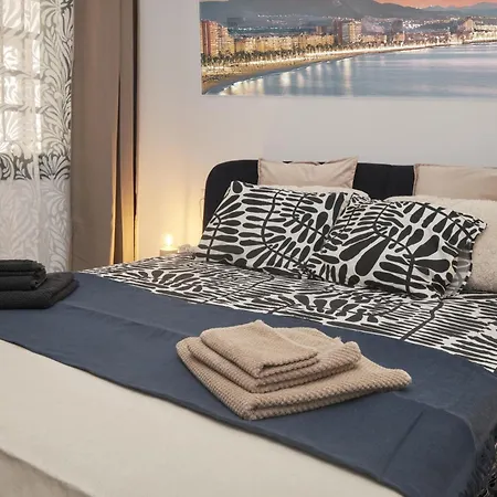Pure Luxe Down Town - Dona M Malaga